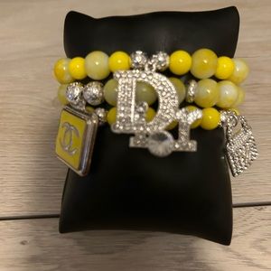 Ladies beaded stretch bracelet with charms